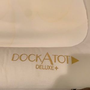 Dock a tot deluxe + plus color white with stain. Used with tags.